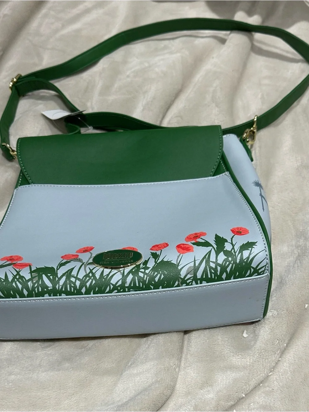 Green Illustrated Crossbody Bag with Gold Emblem